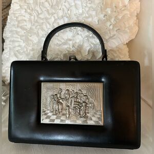 Prestige 60s vintage pewter relief black leather handbag w/red leather interior